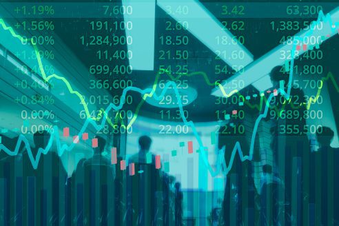 Blurred,of,stock,trader,or,business,men,are,analyzing,stock